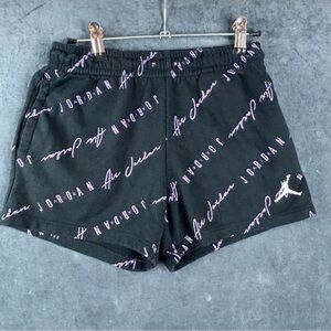 Jordan Boy’s Black Jumpman sweat shorts with purple writing sz Large